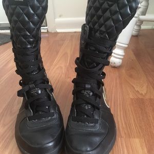 Black/gold Nike Boots